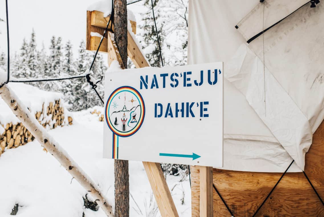 A painted sign that says "Nats'eju Dahk'e", which means “A place of healing” in the North Slavey language.