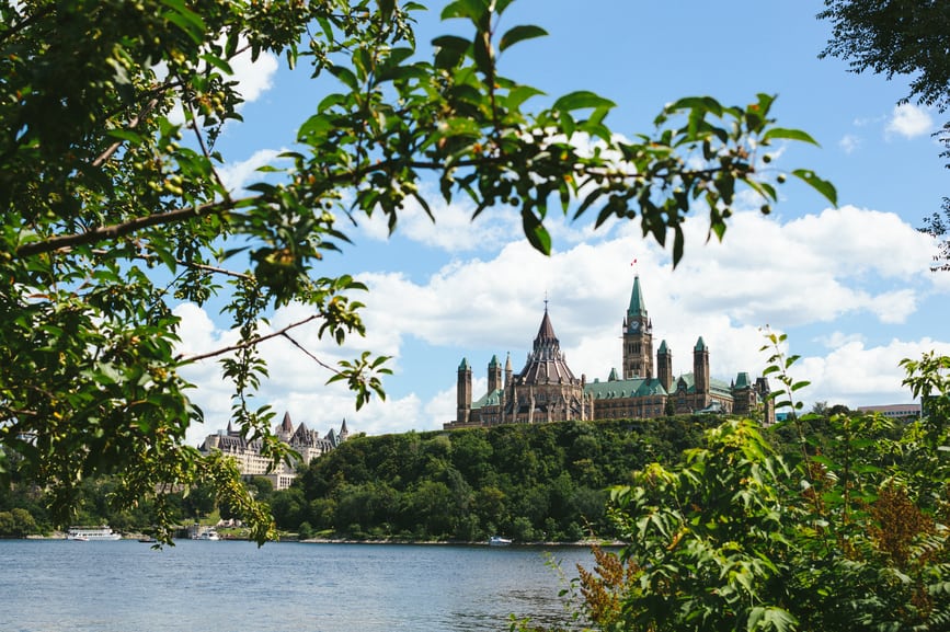 Sunny day with view of Parliament buildings in Ottawa, Ontario.