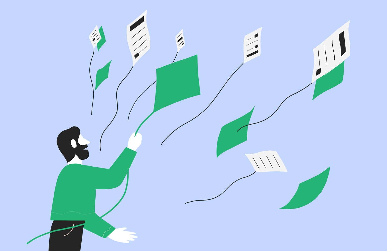 A person holding a kite. Some of the kites are paperwork or newspapers.