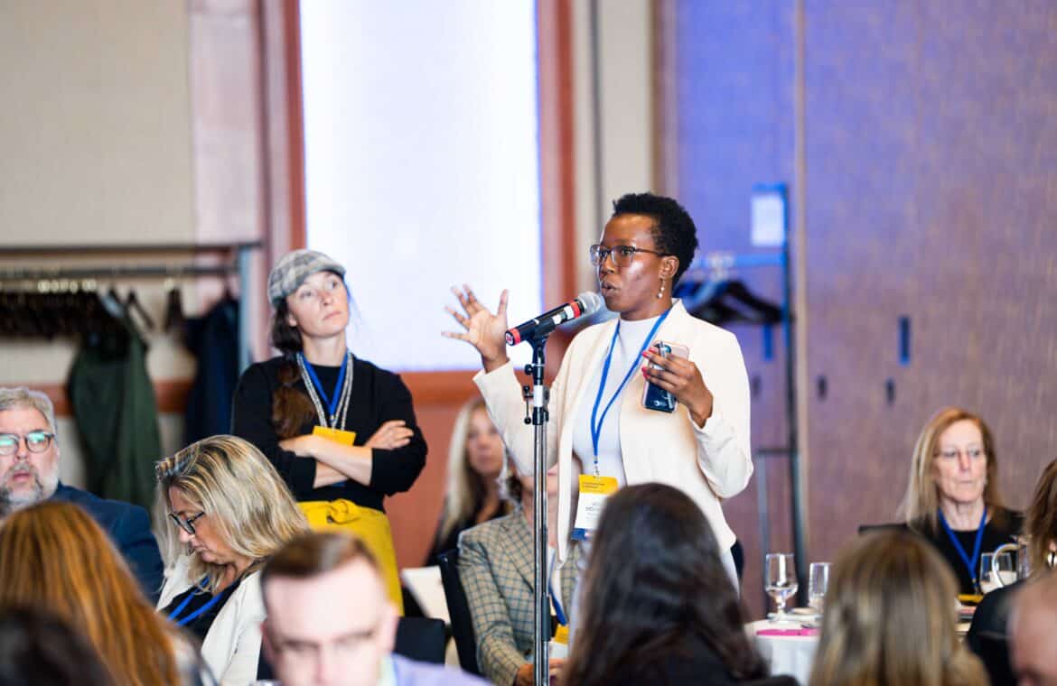 Vicky Mochama, director of communications for Press Forward, speaks at the Charlottetown conference.