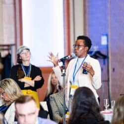 Vicky Mochama, director of communications for Press Forward, speaks at the Charlottetown conference.