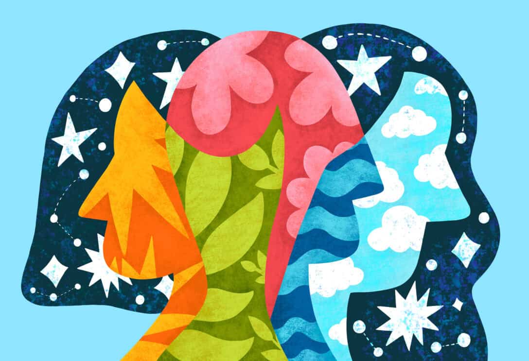 An illustration that shows silhouettes of human profiles filled with colours and patterns against a blue background.